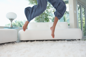 legs jumping on carpet